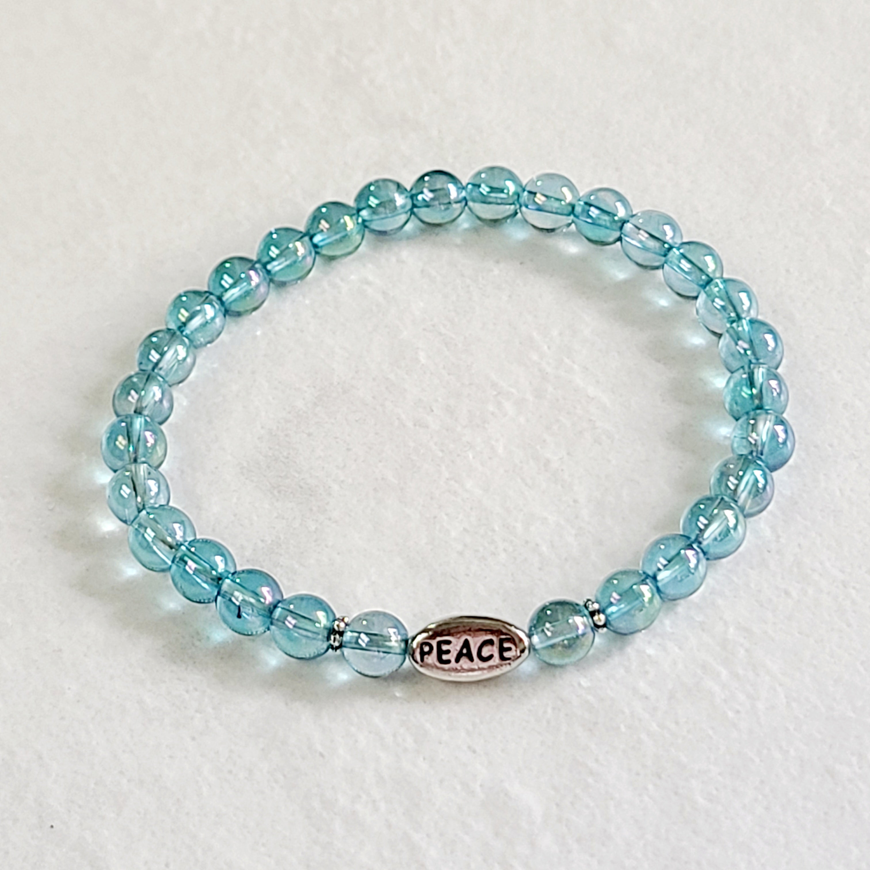 Aqua Aura Quartz Stretch Bracelet with “Peace”