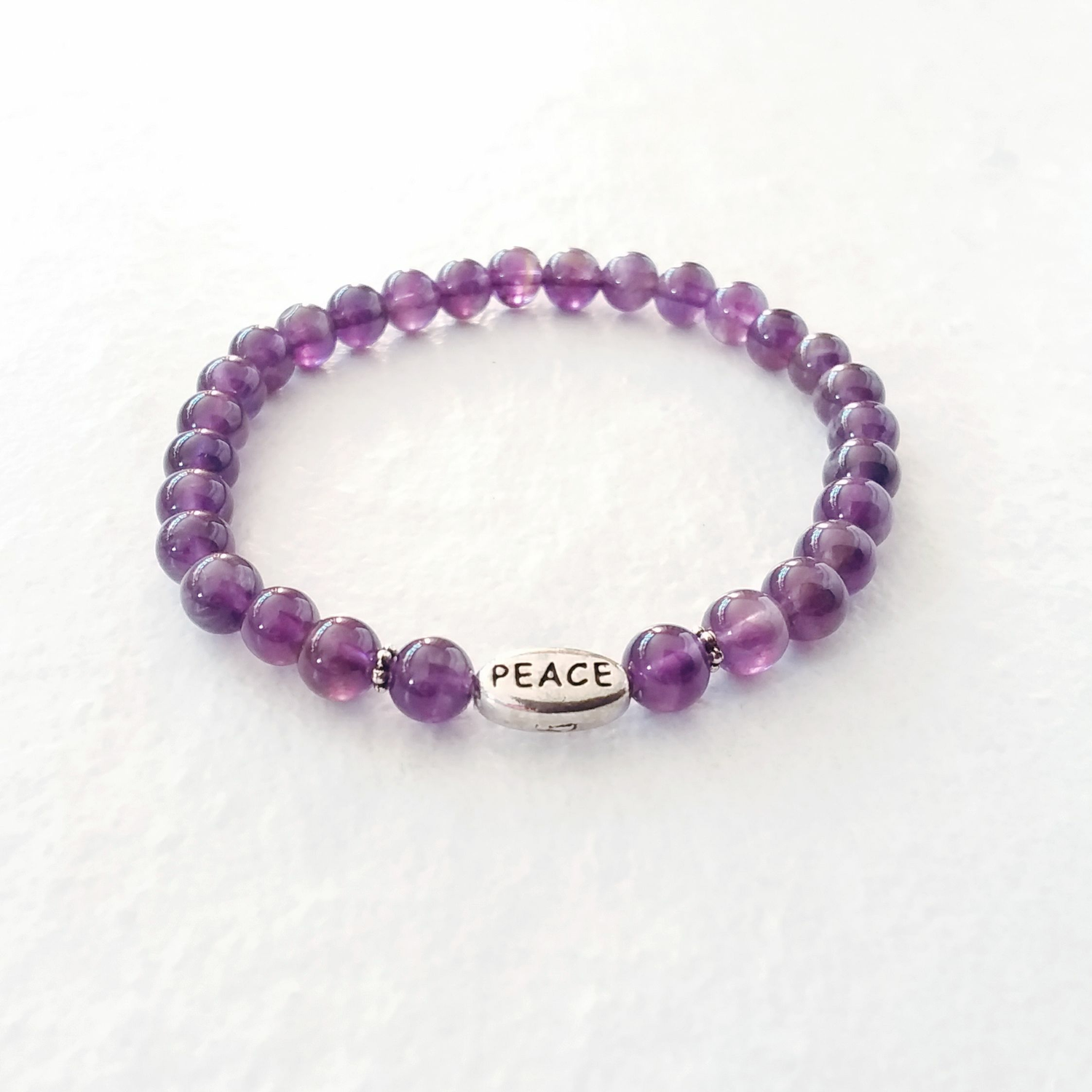 Amethyst Stretch Bracelet with “Peace”